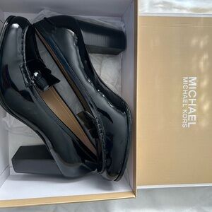 Michael Kors patent leather heeled loafer, women’s size 11.